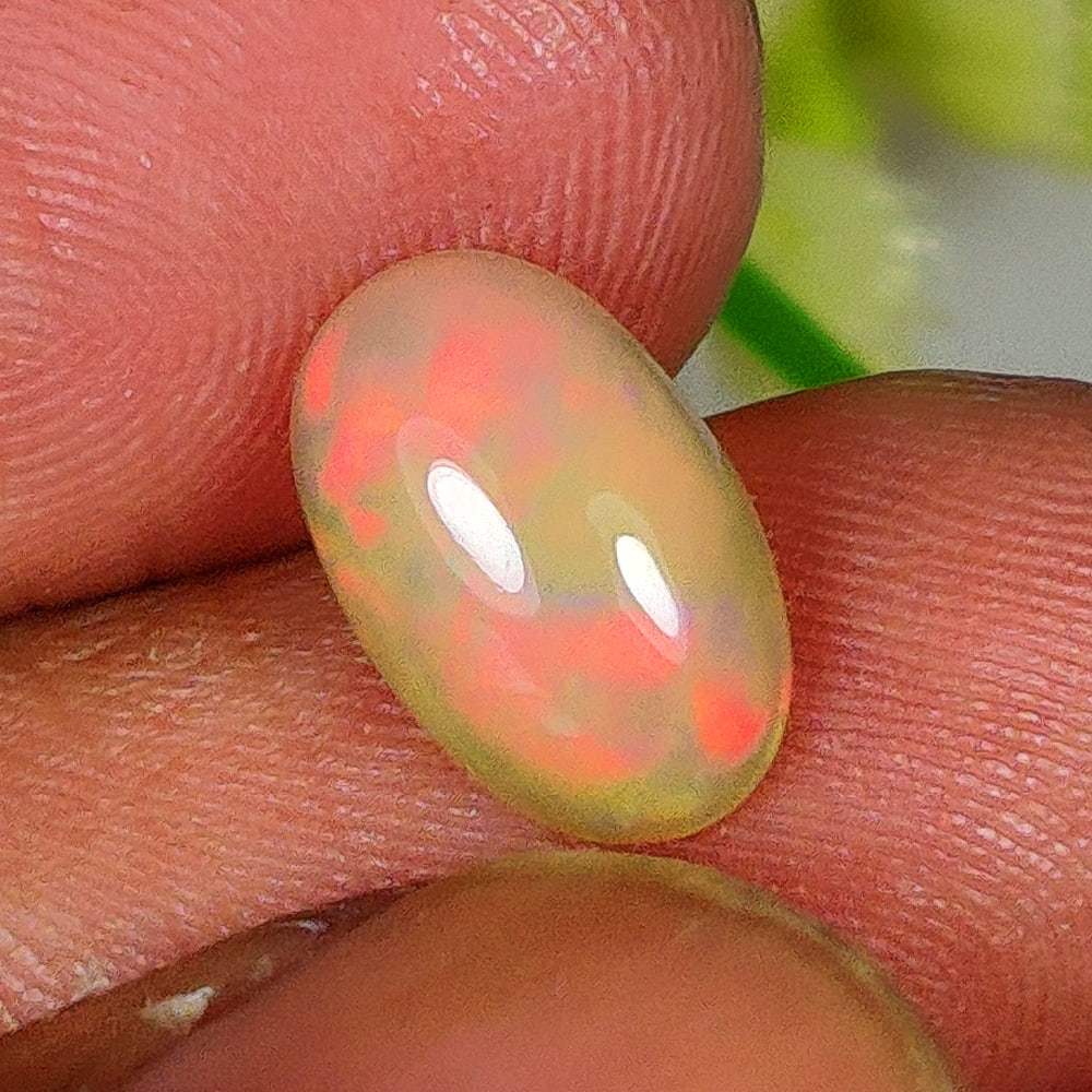 1.31 Ct Natural Multicolor Welo Opal Fire Oval Cab (1 of 2)