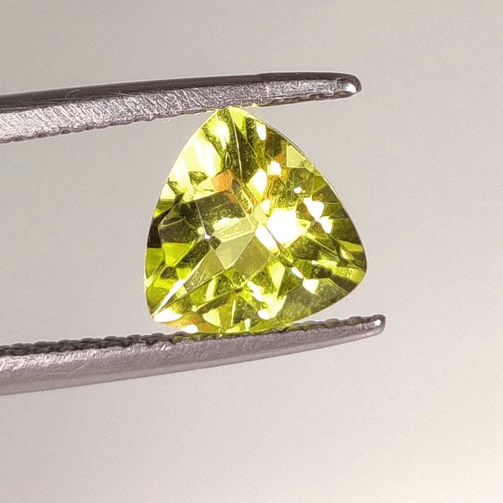 1.77 Ct Natural Lemon Quartz Trillion Cut: Weight - 1.77 Ct / Size - 8.00 x 7.90 x 5.70 mm / Shape - Trillion Cut / Clarity - VVS / Origin - Brazil / Treatment - Heated