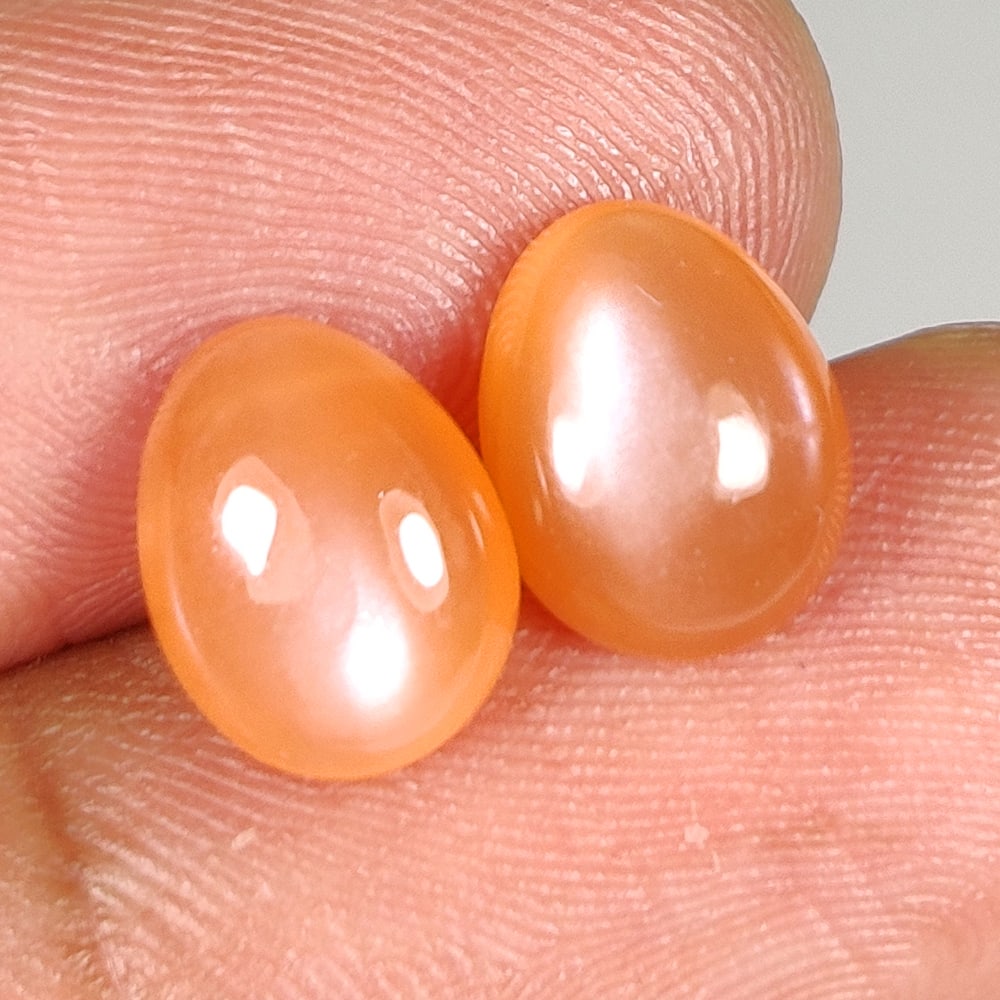 4.20 Ct Natural Orange Moonstone Oval Cab Pair: Weight - 4.20 Ct / Dimensions - 9.60 x 7.50 x 4.20 mm / 2 Pc's / Shape - OVal Cab / Transparency -OPaque / Origin - India / Treatment - None