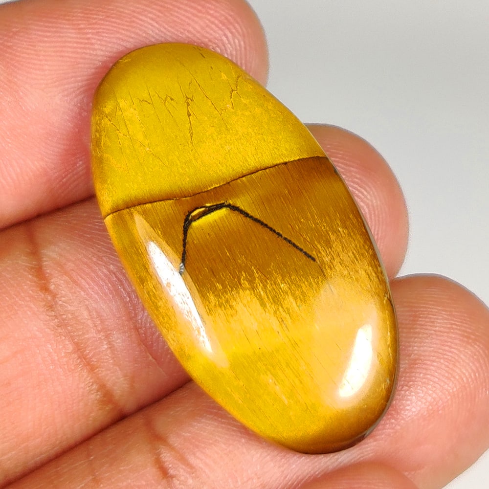 24.07 Ct Natural Tiger Eye Oval Cab (1 of 2)