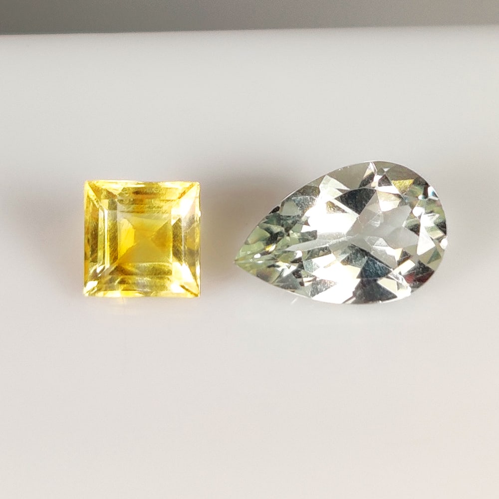 5.06 Ct Natural Green Amethyst & citrine Square & Pear Cut Pair: Weight - 5.06 Ct / Dimensions - 7.0x7.0 & 13.0x8.5 mm / 2 Pc's / Shape - Pear & Square cut / Color - Green & Purple / Clarity - Transparent / Origin - Brazil / Treatment - Heated
