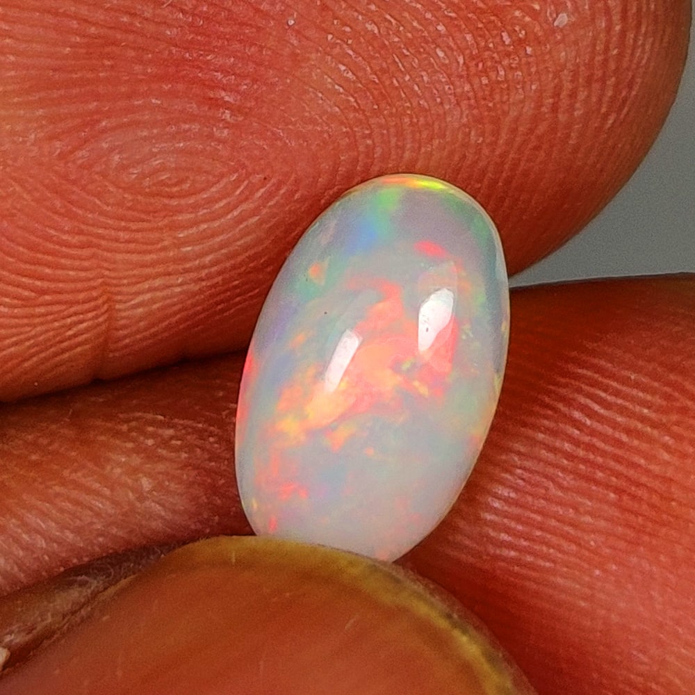 1.09 Ct Natural Multicolor Welo Opal Top Fire Oval Cab (1 of 2)
