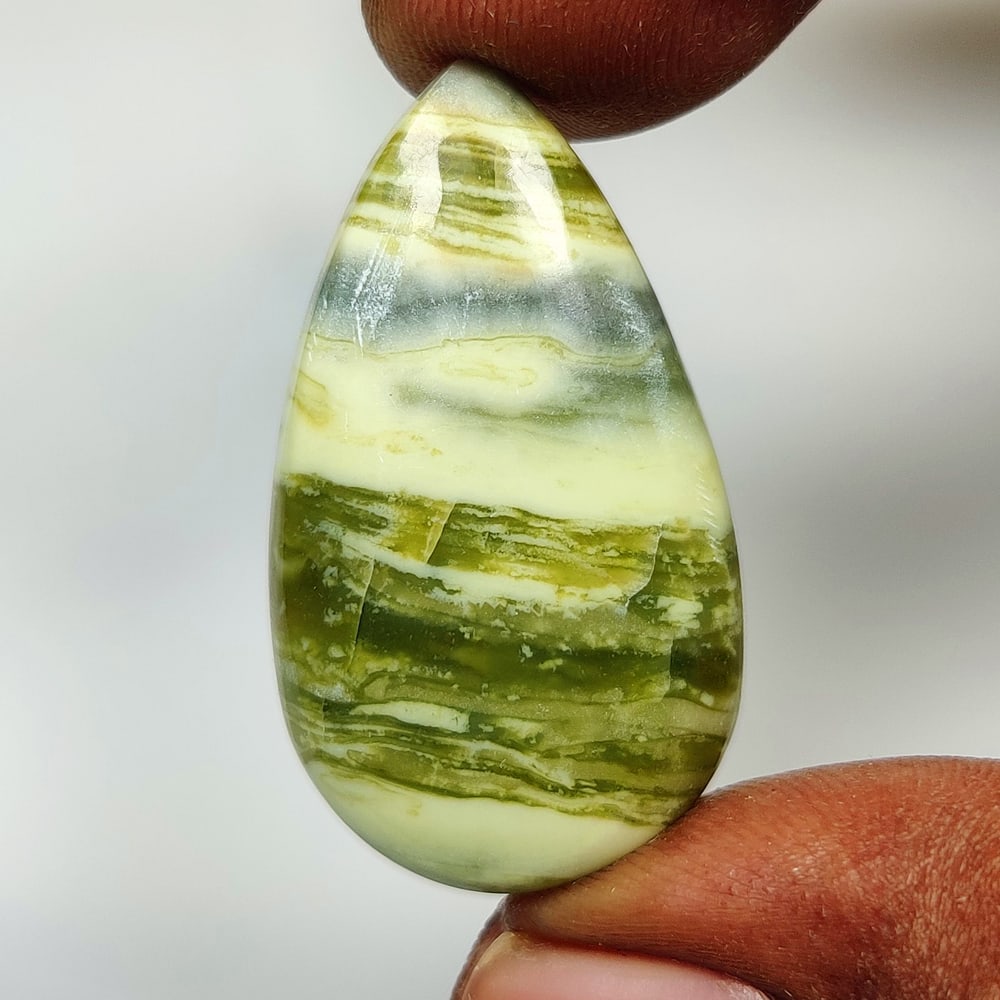 25.29 Ct Natural Green Serpentine Pear Cab (1 of 2)