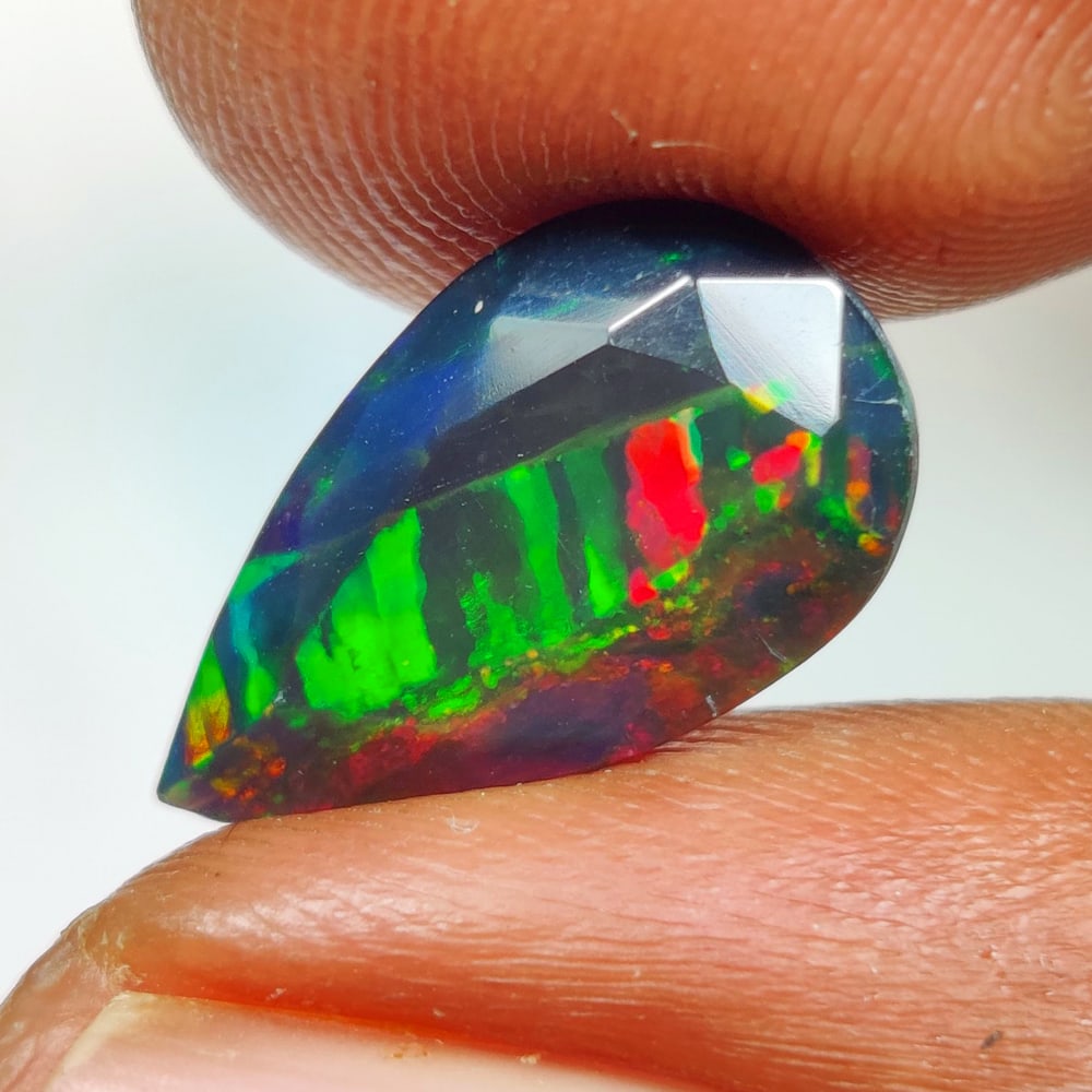 2.45 Ct Natural Black Flashing Fire Opal Pear Cut (1 of 2)