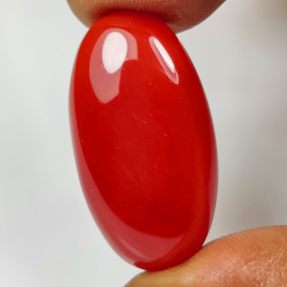 30.05 Ct Natural Deep Orange Onyx Oval Cab: Weight - 30.05 Ct / Dimensions - 31.00 x 16.10 x 7.40 mm / Shape - Oval Cab / Clarity - Opaque / Origin - Brazil / Comments - None