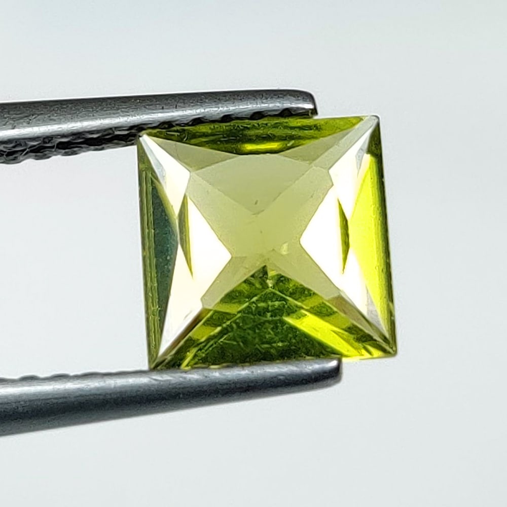 1.22 Ct Natural Green Peridot Princess Cut: Weight - 1.22 Ct / Dimensions - 7.00 x 7.00 x 3.30 mm / Shape - Princess Cut / Color - Green / Clarity - VVS / Origin - Pakistan / Treatment - None