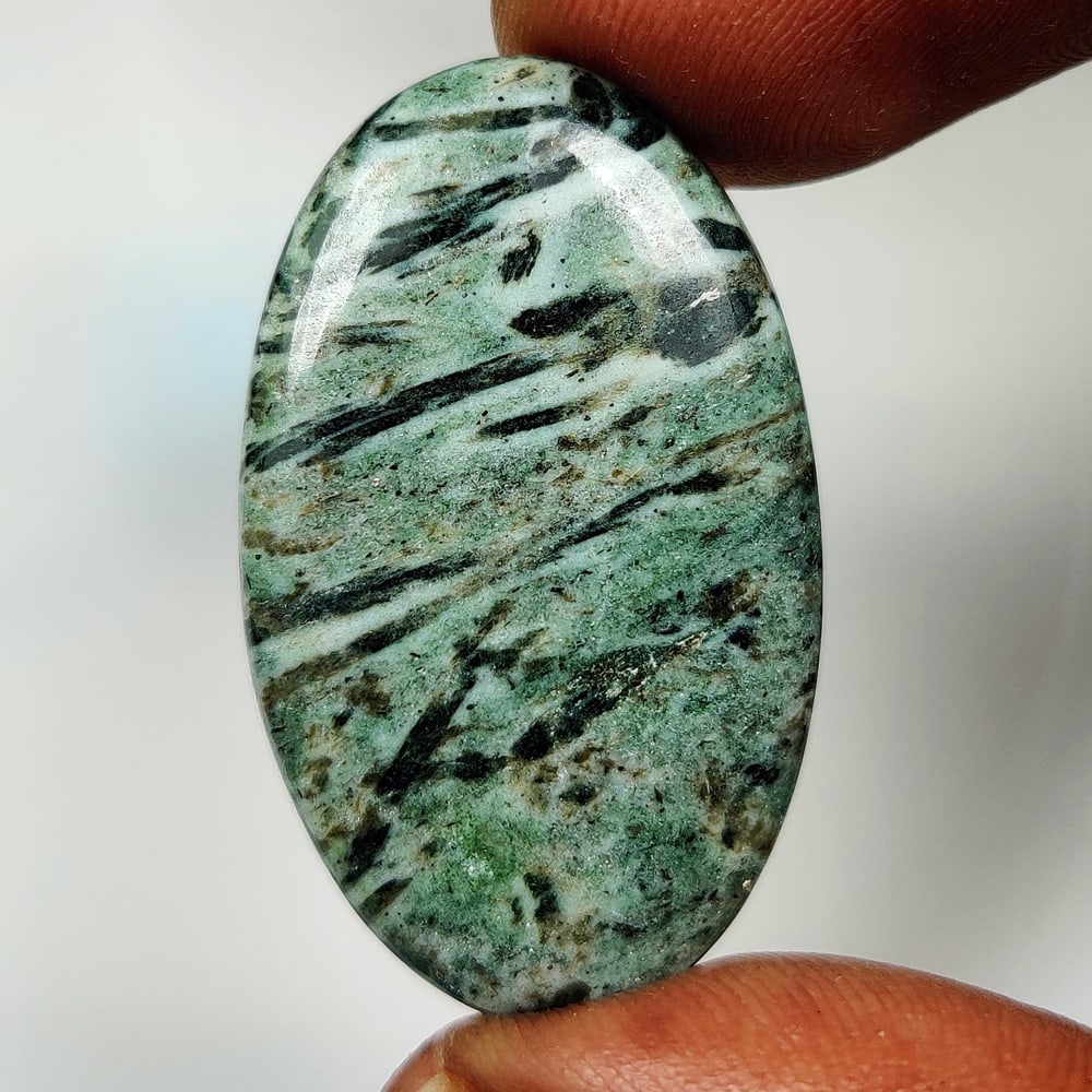 33.83 Ct Natural Hornblende Oval Cab (1 of 2)