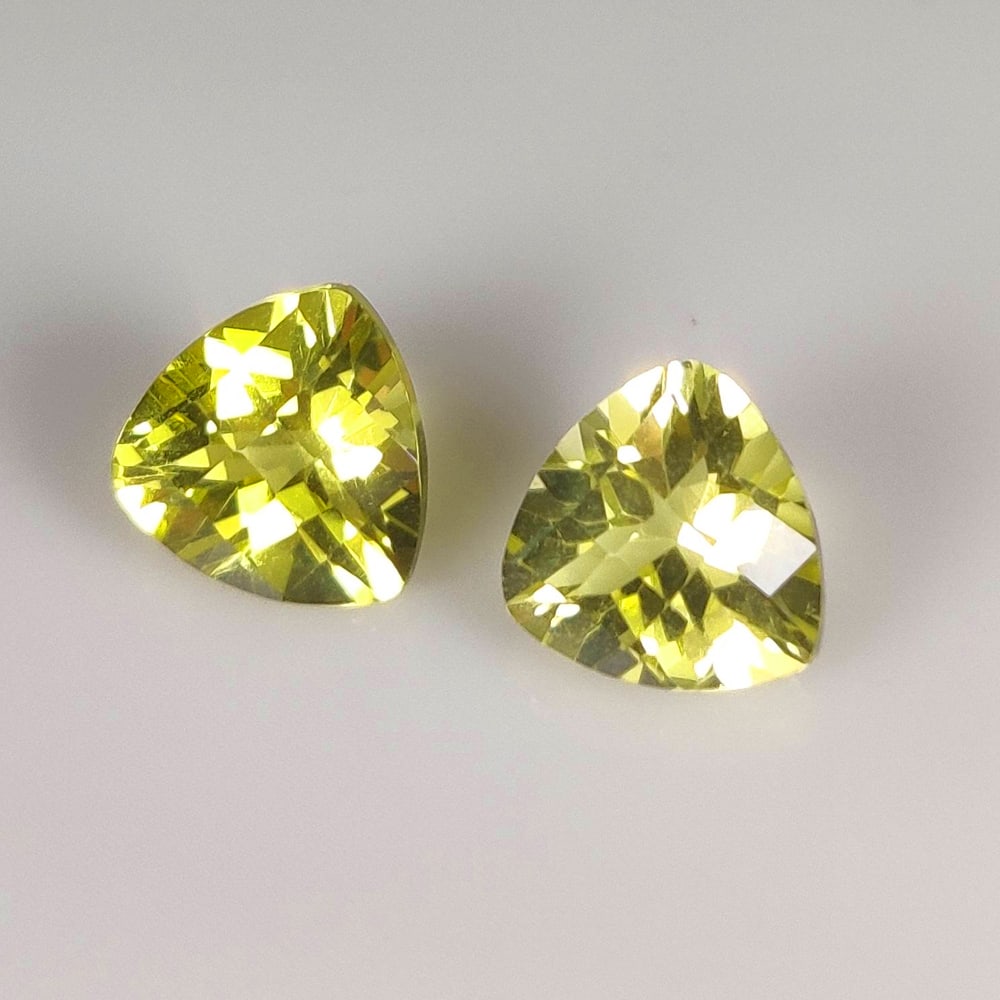 3.60 Ct Natural Lemon Quartz Trillion Cut Pair: Weight - 3.60 Ct / Size - 8.0x8.0 - 8.2x8.0 mm / 2 Pc's / Shape - Trillion Cut / Clarity - VVS / Origin - Brazil / Treatment - Heated