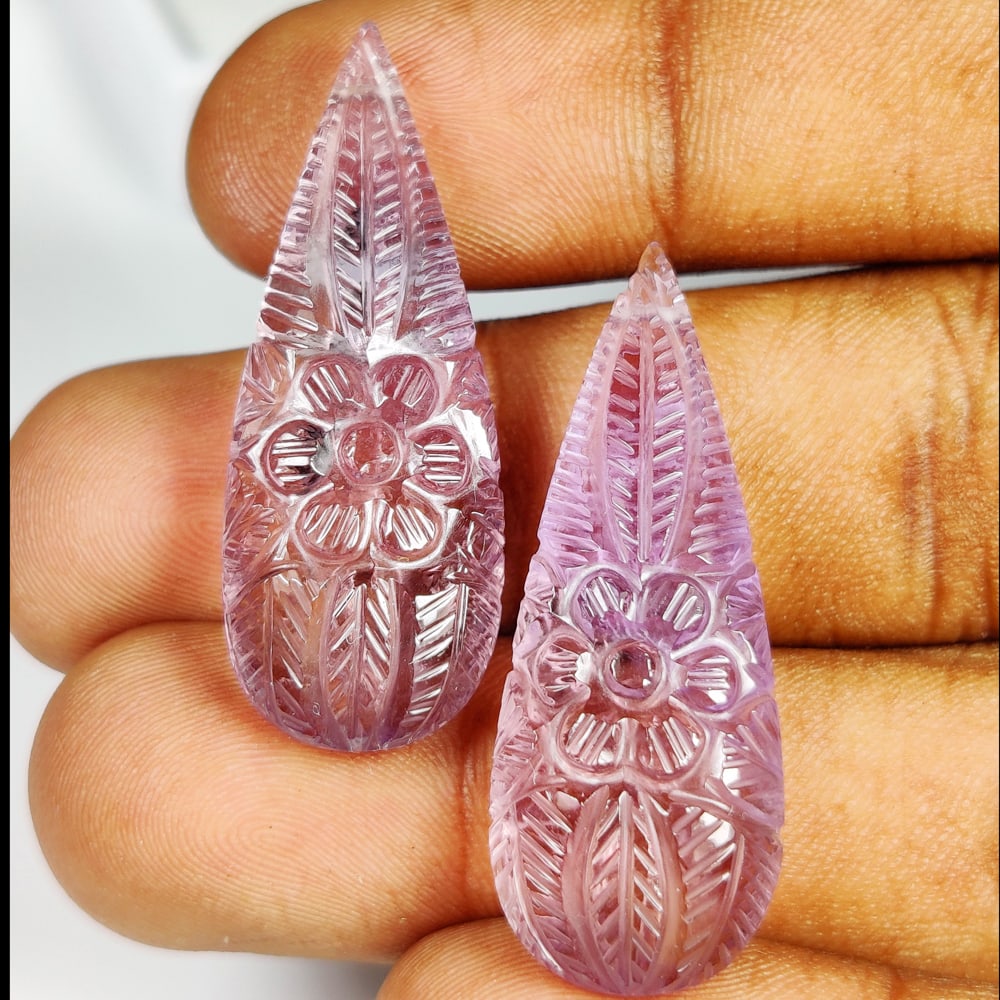 44.84 Ct Natural Purple Amethyst Pear Carving Pair: Weight - 44.84 Ct / Size - 35.00 x 13.00 x 8.00 mm / Shape - Pear Carving Cab / Color - Purple / Clarity - VVS / Origin -Brazil / Treatment - Heated