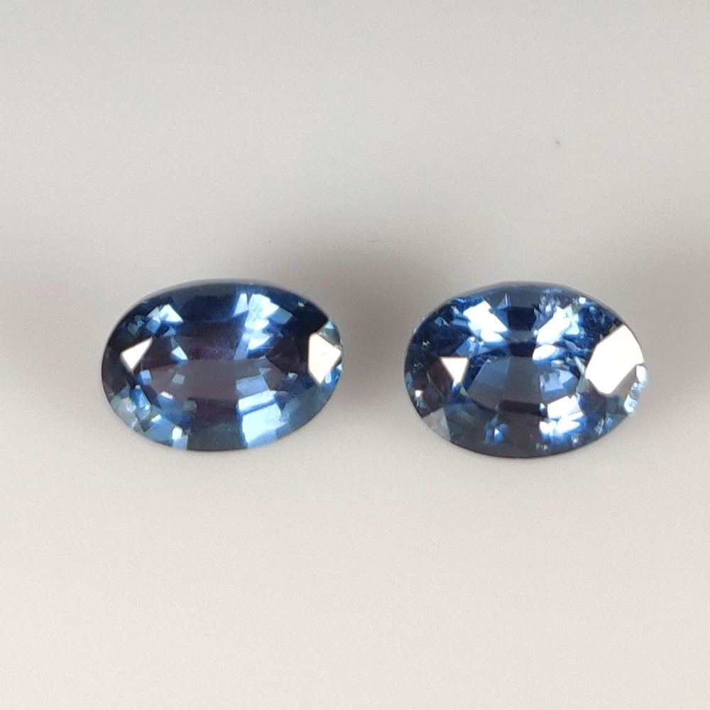 1.88 Ct Natural Spinel Oval Cut Pair: Weight - 1.88 Ct / Size - 6.8x5.0 - 6.9x4.9 mm / 2 PC's / Shape - OVal Cut / Color - Blue / Clarity - VVS / Origin - Mozambique / Treatment - None