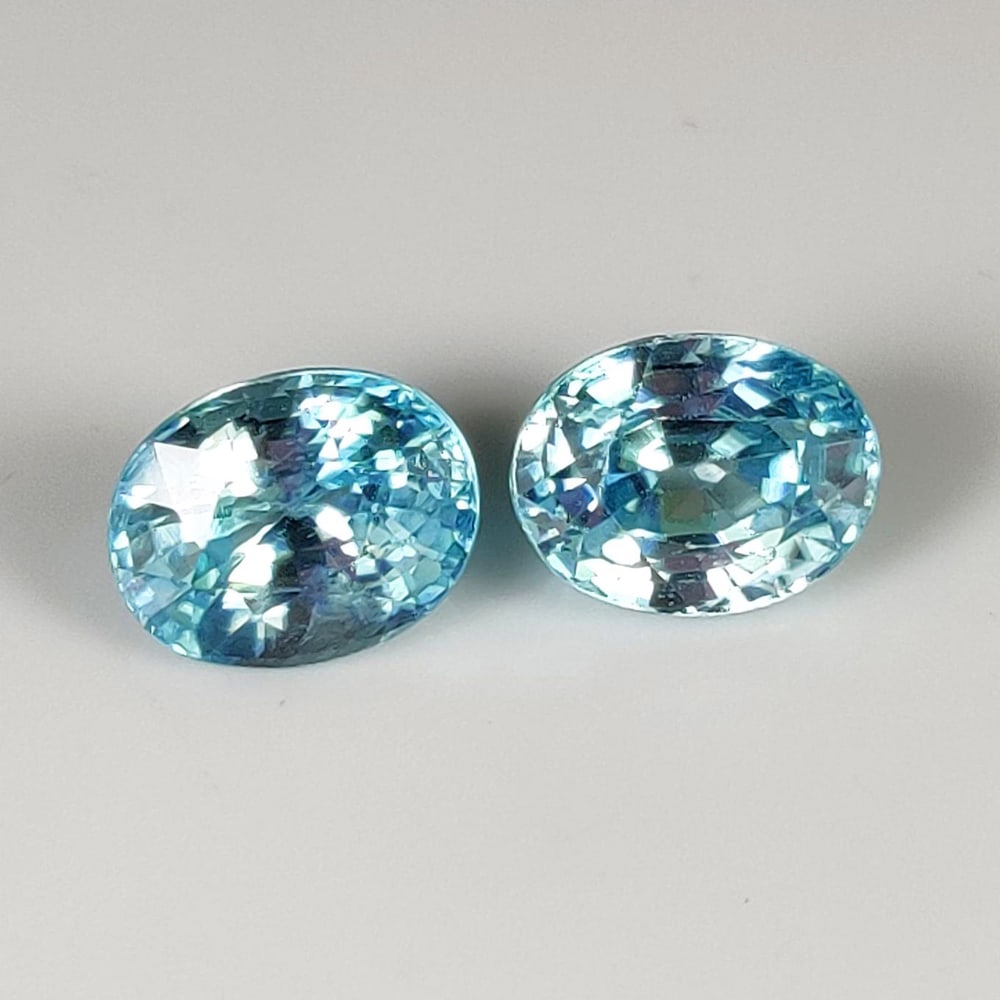 3.50 Ct Natural Blue Zircon Oval Cut Pair: Weight - 3.50 Ct / Size - 9.00 x 7.00 x 5.50 mm / 2 Pc's / Shape - Oval Cut / Color - Blue / Clarity - VVS / Origin - Cambodia / Treatment - Gentle Heat