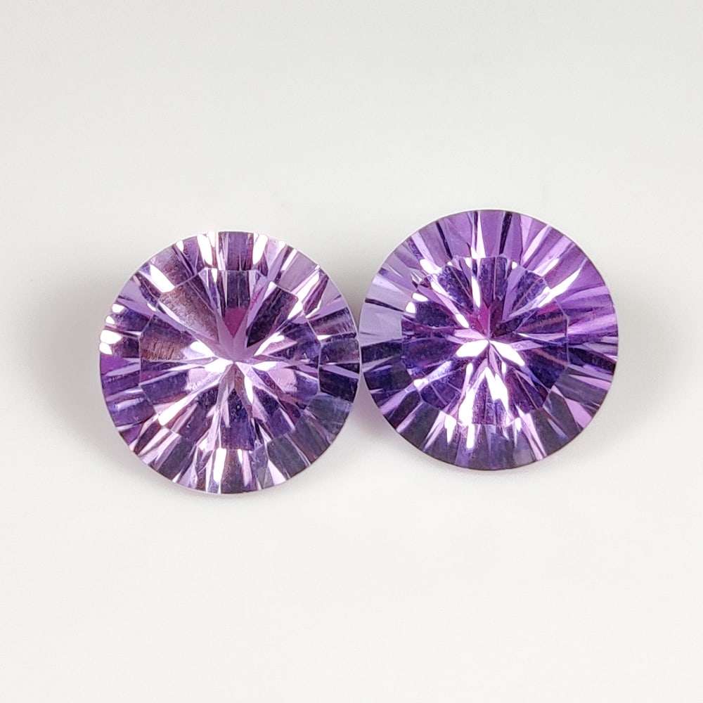 6.23 Ct Natural Purple Amethyst Round Cut: Weight - 6.23 Ct / Dimensions -10.00 x 10.00 x 6.50 mm / 2 Pc's / Shape - Round Cut / Color - Purple / Clarity - VVS / Origin -Brazil / Treatment - Heated