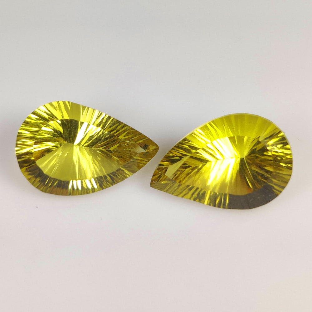 17.77 Ct Natural Lemon Quartz Pear Cut Pair: Weight - 17.77 Ct / Size - 18.20 x 12.10 x 8.30 mm / 2 Pc's / Shape - Pear Cut / Clarity - VVS / Origin - Brazil / Treatment - Heated