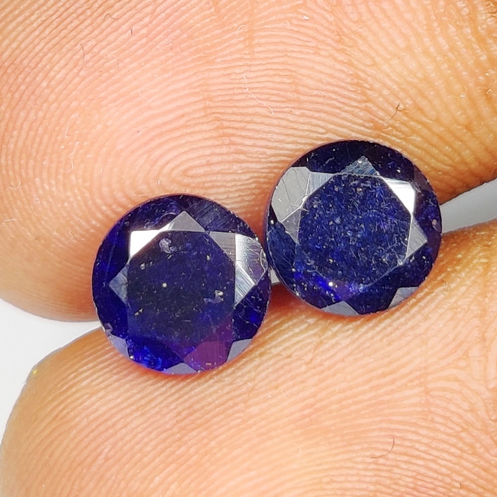 4.08 Ct Natural Blue Sapphire Round Cut Pair: Weight - 4.08 Ct / Dimensions- 7.00 x 7.00 x 4.30 mm / 2 Pc's / Shape - Round Cut / Clarity - Opaque / Origin - Sri Lanka / Treatment - Diffused