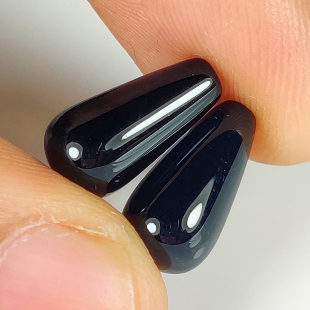 8.30 Ct Natural Black Onyx Fancy Pear Drop Pair: Weight - 8.30 Ct / Size - 13.30 x 6.80 x 6.80 mm / 2 Pc's / Shape - Fancy Pear Drop / Color - Black / Clarity - OPaque / Origin - Africa / Treatment - None