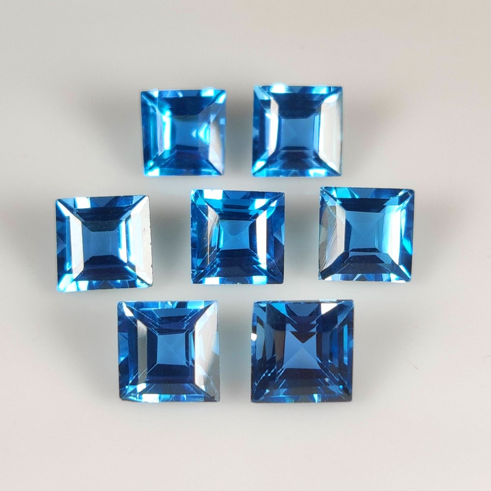 18.18 Ct Natural London Blue Topaz Square Cut Necklace Set: Weight - 18.18 Ct / Size - 6.80 - 7.00 mm / 7 Pc's / Shape - Square Cut / Color - Blue / Clarity - VVS / Origin - Brazil / Treatment - Irradiated