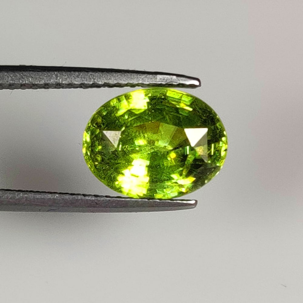 4.21 Ct Natural Green Peridot Oval Cut (1 of 2)
