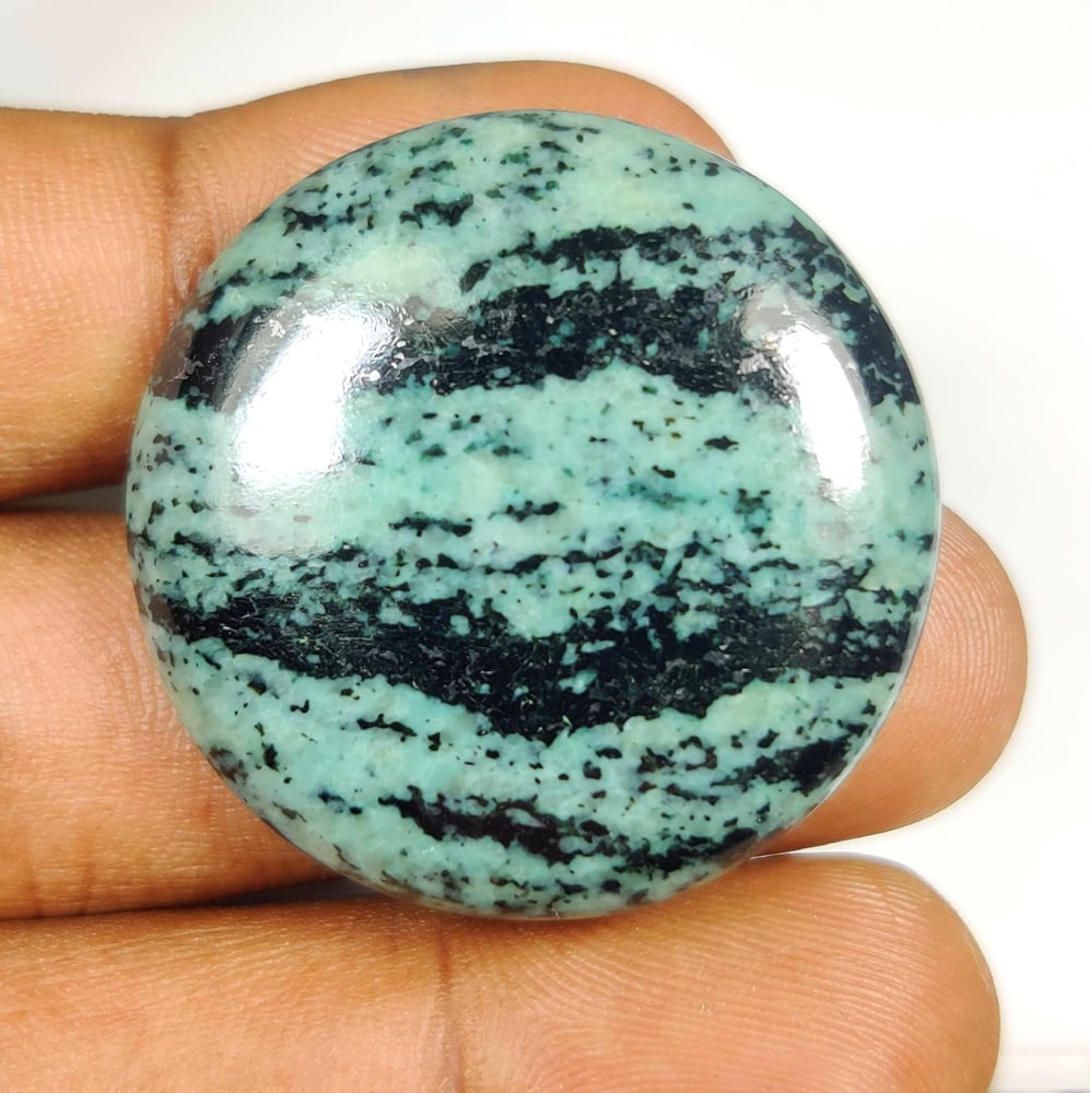 60.28 Ct Natural Ruby Zoisite Round Cab (1 of 2)