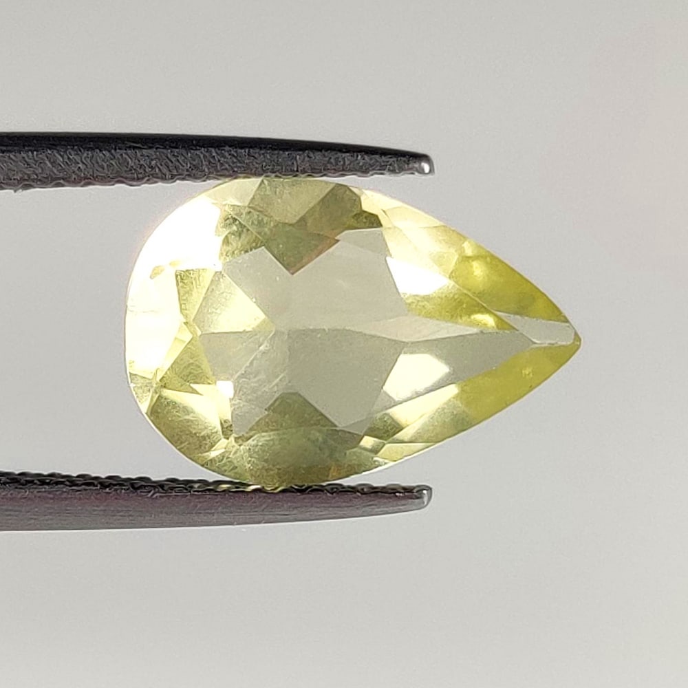 3.11 Ct Natural Lemon Quartz Pear Cut: Weight - 3.11 Ct / Dimensions - 13.00 x 9.00 x 5.00 mm / Shape - Pear Cut / Clarity - VVS / Origin - Brazil / Treatment - Heated