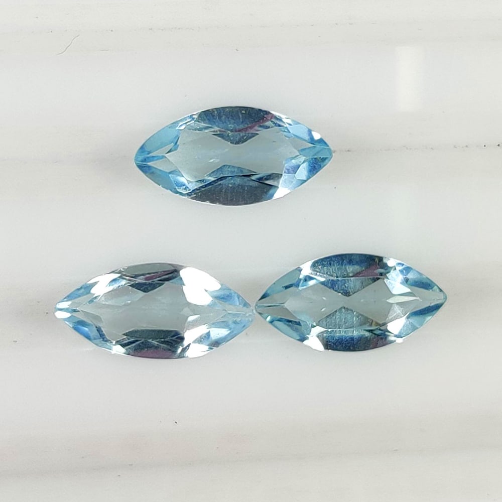 3.50 Ct Natural Blue Topaz Marquise Cut Set: Weight - 3.50 Ct / Size - 10.0x5.0 - 10.1x5.1 mm / 3 Pc's / Shape - Marquise Cut / Color - Blue / Clarity - VVS / Origin - Brazil / Treatment - Irradiated