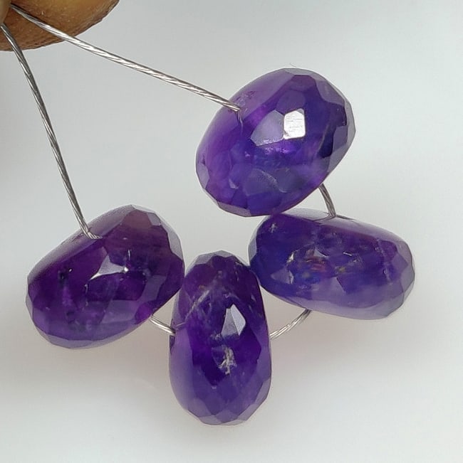 9.09 Ct Natural Purple Amethyst Round Cut Beads: Weight - 9.09 Ct / Size -7.70 - 8.10 mm / 4 Pc's / Shape - Round Cut Beads / Color - Purple / Clarity - VVS / Origin -Brazil / Treatment - Heated