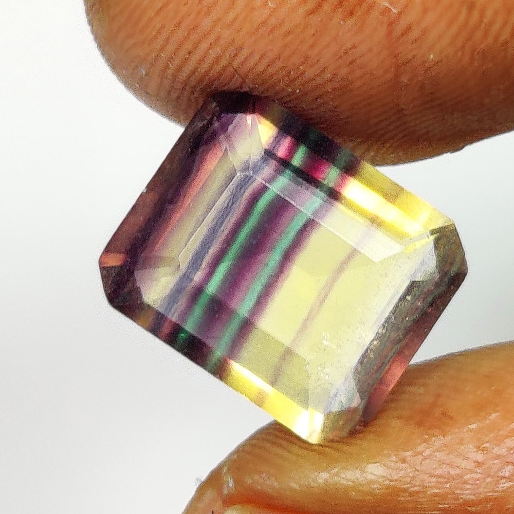 6.07 Ct Natural Multicolor Flourite Emerald Cut (1 of 2)