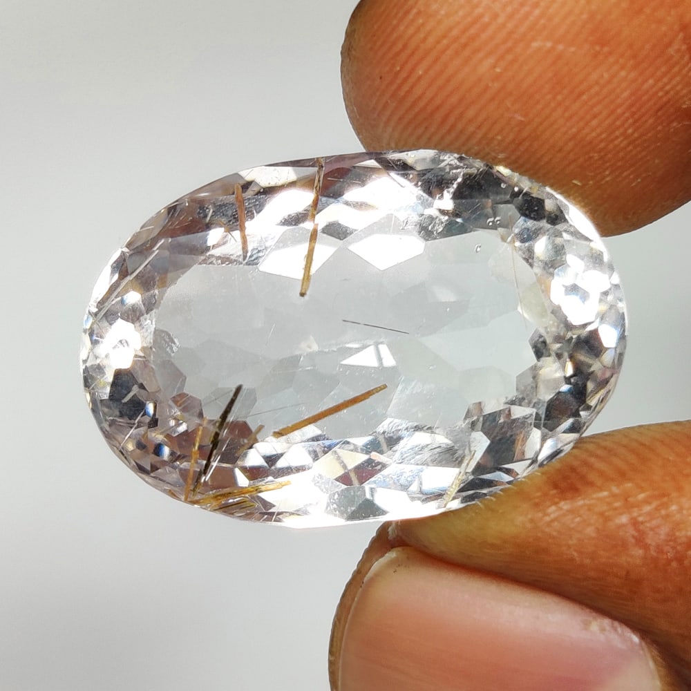 21.48 Ct Natural Rutile Quartz Oval Cut: Weight - 21.48 Ct / Dimensions - 22.00 x 14.80 x 10.70 mm / Shape & Cut - Oval Cut / Transparency - Transaprent / Origin - Norway / Comments - None