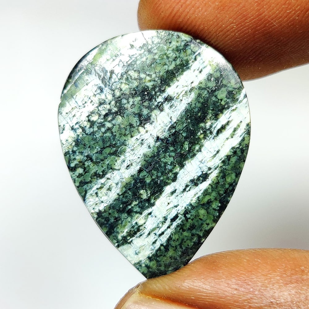 21.11 Ct Natural Swiss Opal Pear Cab: Weight - 21.11 Ct / Dimensions - 29.00 x 23.00 x 4.80 mm / Shape - Pear Cab / Clarity - Translucent / Origin - Brazil / Treatment - None