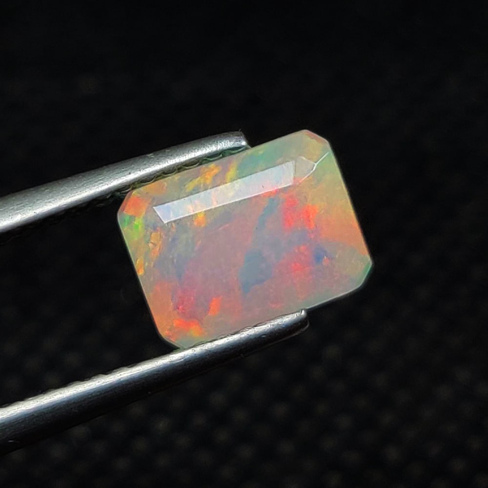 1.08 Ct Natural Multicolor Welo Opal Top Fire Emerald Cut (1 of 2)