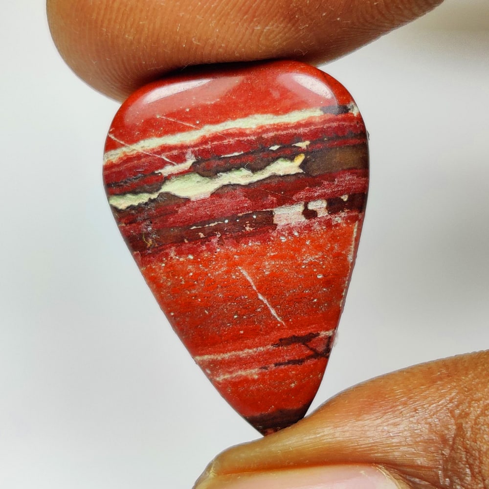 18.00 Ct Natural Red Jasper Pear Cab: Weight - 18.00 Ct / Dimensions - 28.00 x 17.60 x 5.50 mm / Shape - Pear Cab / Transparency - Opaque / Origin - brazil / Treatment - None