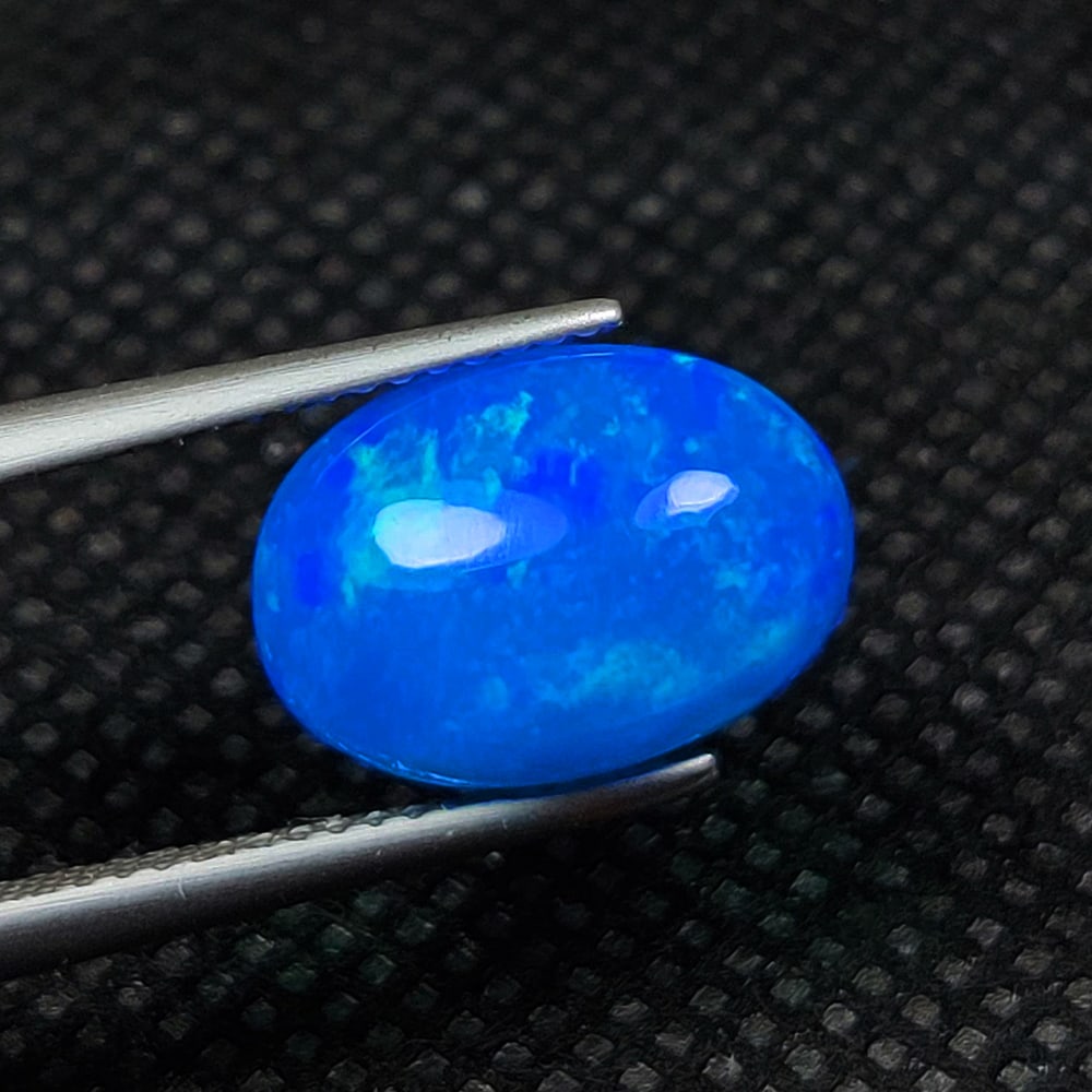 3.06 Ct Natural Blue Fire Opal Oval Cab (1 of 2)