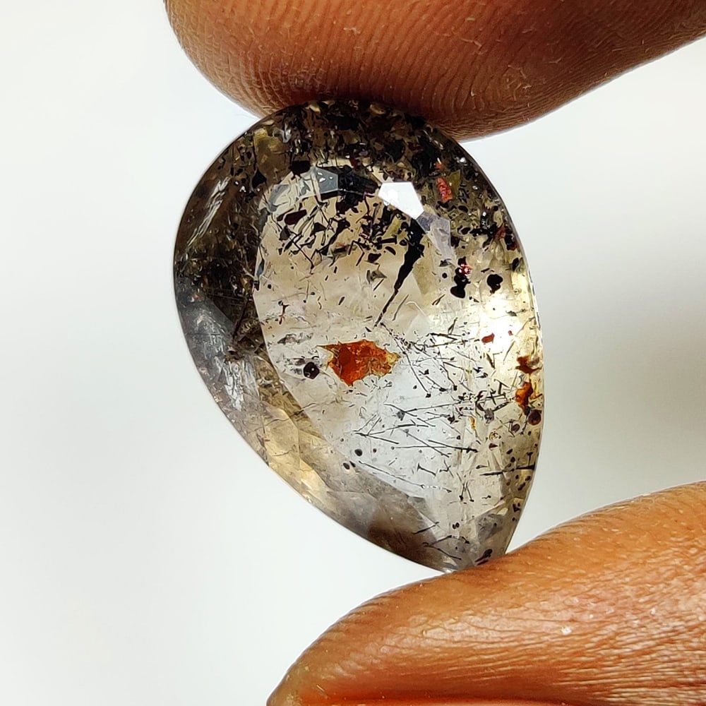 13.93 Ct Natural Rutile Quartz Pear Cut: Weight - 13.93 Ct / Dimensions - 20.00 x 13.50 x 9.20 mm / Shape & Cut - Pear Cut / Transparency - Transparent / Origin - Norway / Comments - None