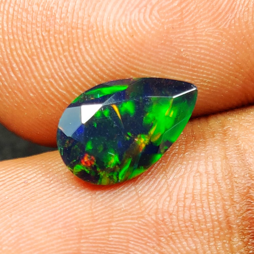 1.30 Ct Natural Black Flashing Fire Opal Pear Cut (1 of 2)