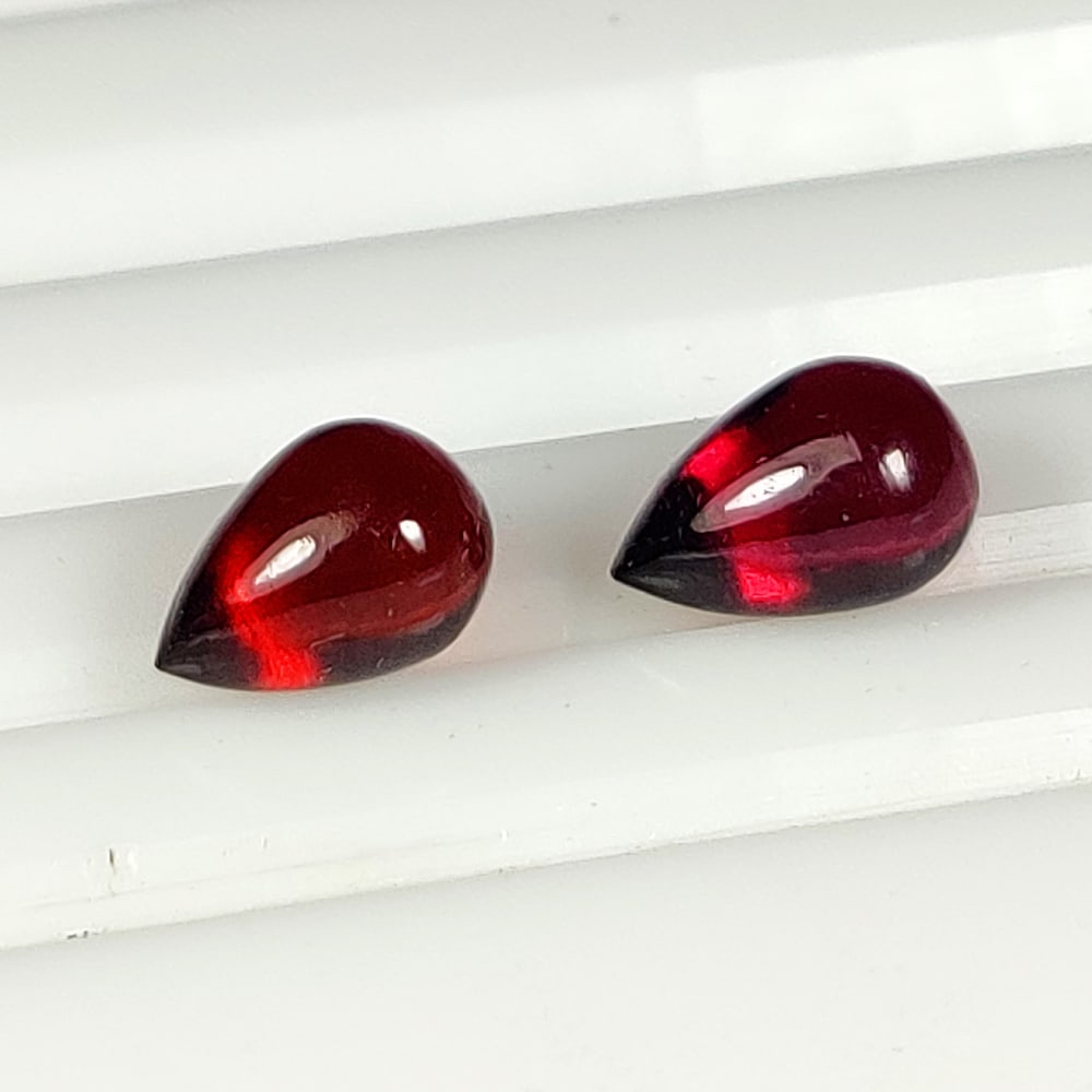 3.95 Ct Natural Rhodolite Garnet Pear Drop Pair: Weight - 3.95 Ct / Dimensions - 8.00 x 5.40 mm / 2 Pc's / Shape - Pear Beads / Clarity - VVS / Origin - Nigeria / Treatment - None