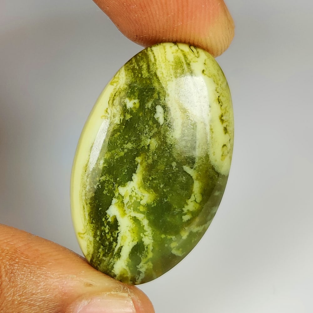 30.27 Ct Natural Green Serpentine Oval Cab (1 of 2)