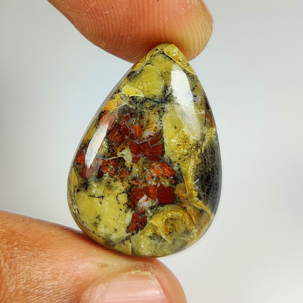 17.04 Ct Natural Peanut Obisidan Pear Cab (1 of 2)