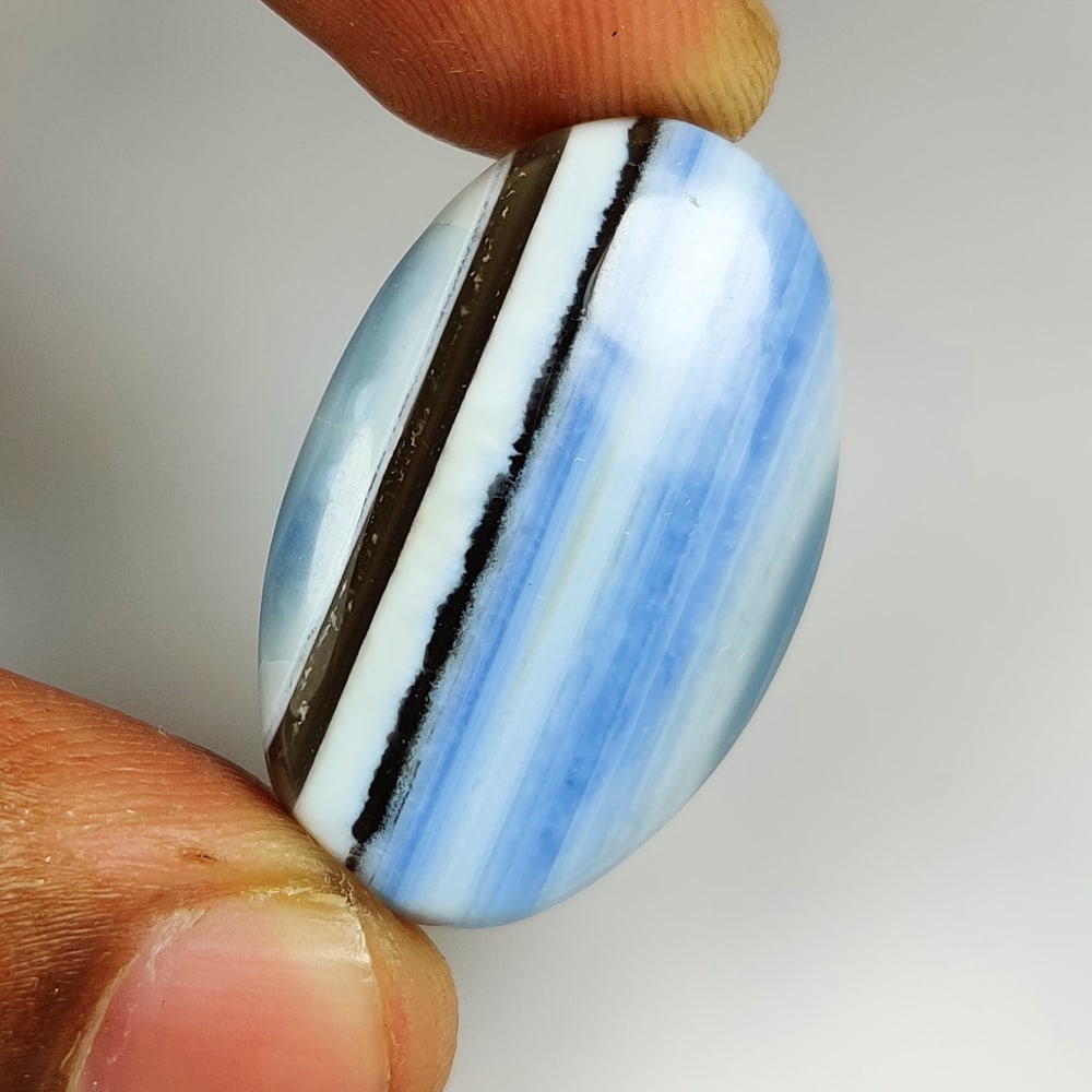 27.23 Ct Natural Owyhee Blue Opal Oval Cab (1 of 2)
