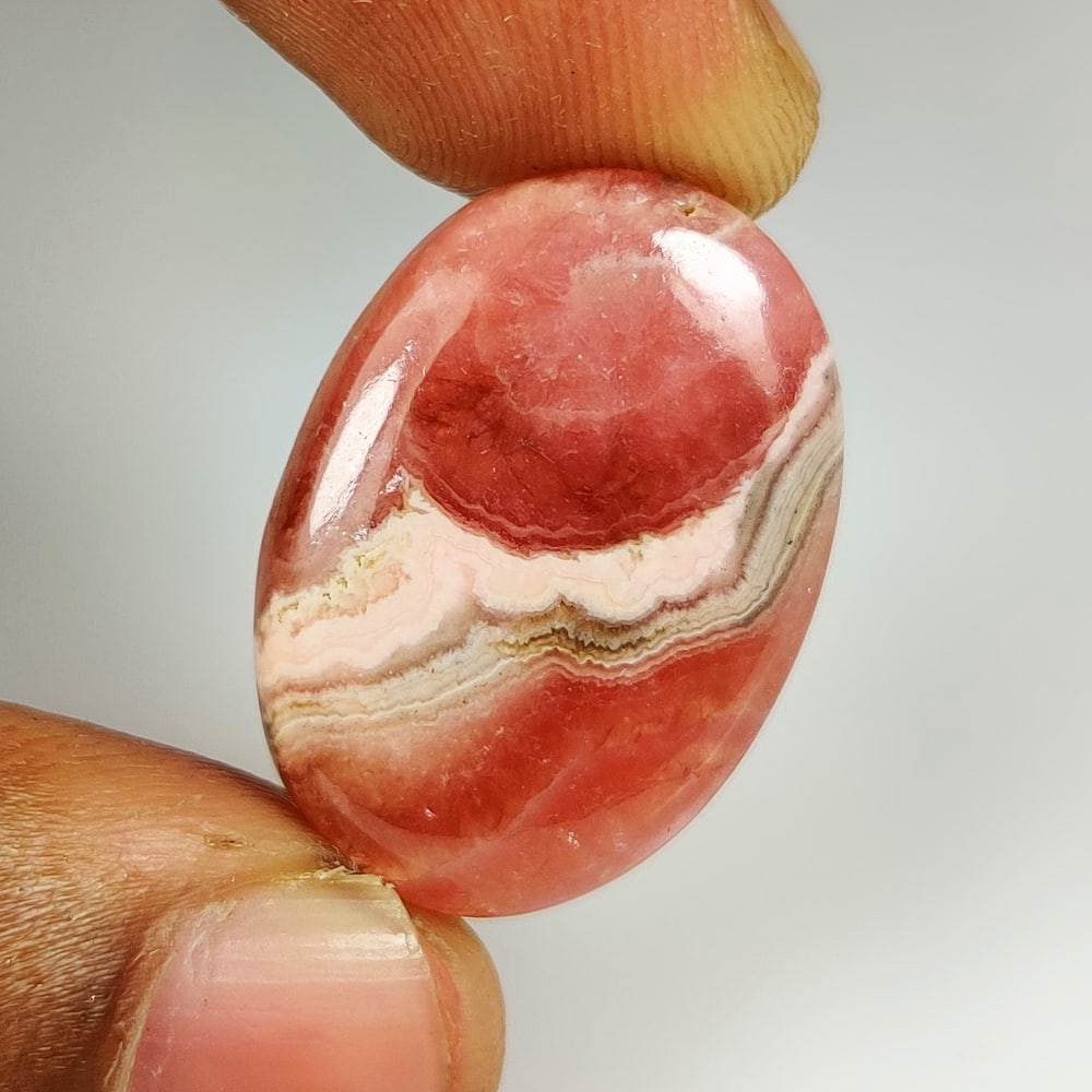 25.34 Ct Natural Pink Rhodochrosite Oval Cab (1 of 2)