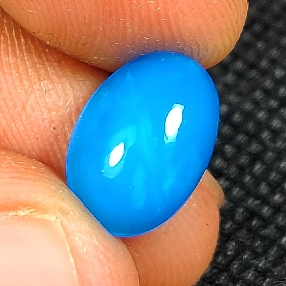 2.47 Ct Natural Blue Fire Opal Oval Cab (1 of 2)