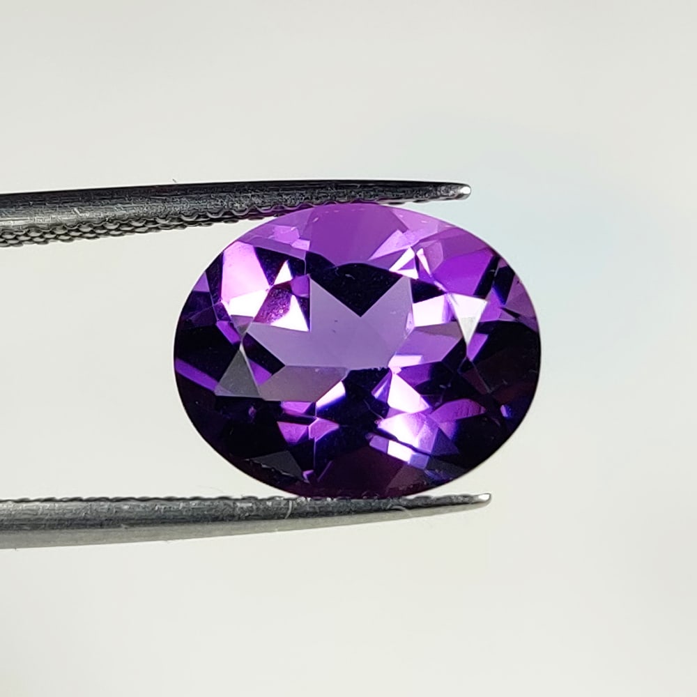 4.25 Ct Natural Purple Amethyst Oval Cut: Weight - 4.25 Ct / Dimensions - 12.00 x 9.80 x 7.10 mm / Shape - Oval Cut / Color - Purple / Clarity - VVS / Origin - Brazil / Treatment - Heated