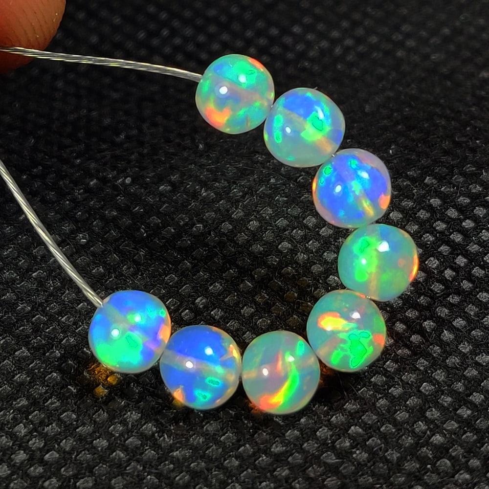 4.46 Ct Natural Multicolor Fire Welo Opal Ball Beads (1 of 2)