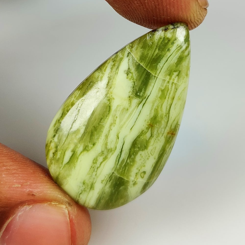 20.67 Ct Natural Green Serpentine Pear Cab (1 of 2)