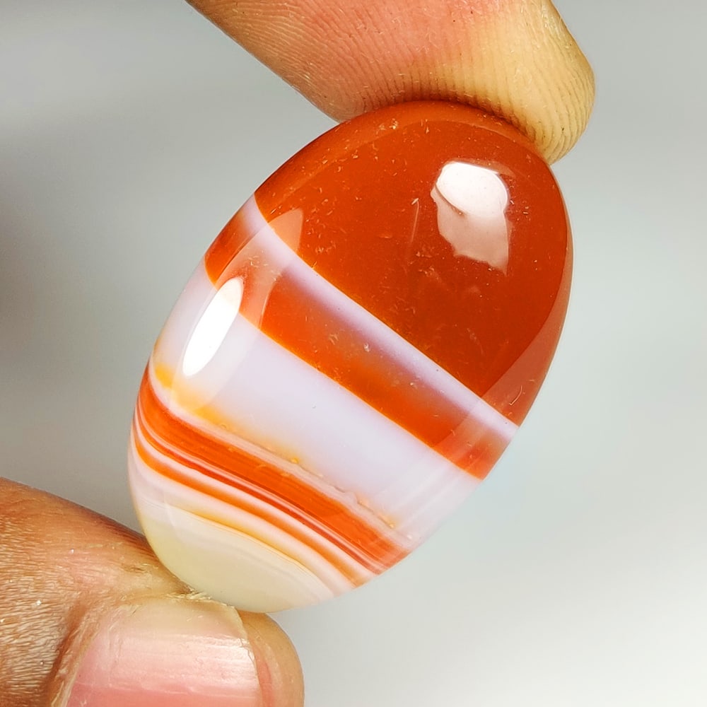 37.13 Ct Natural Orange Botswana Agate Oval Cab (1 of 2)