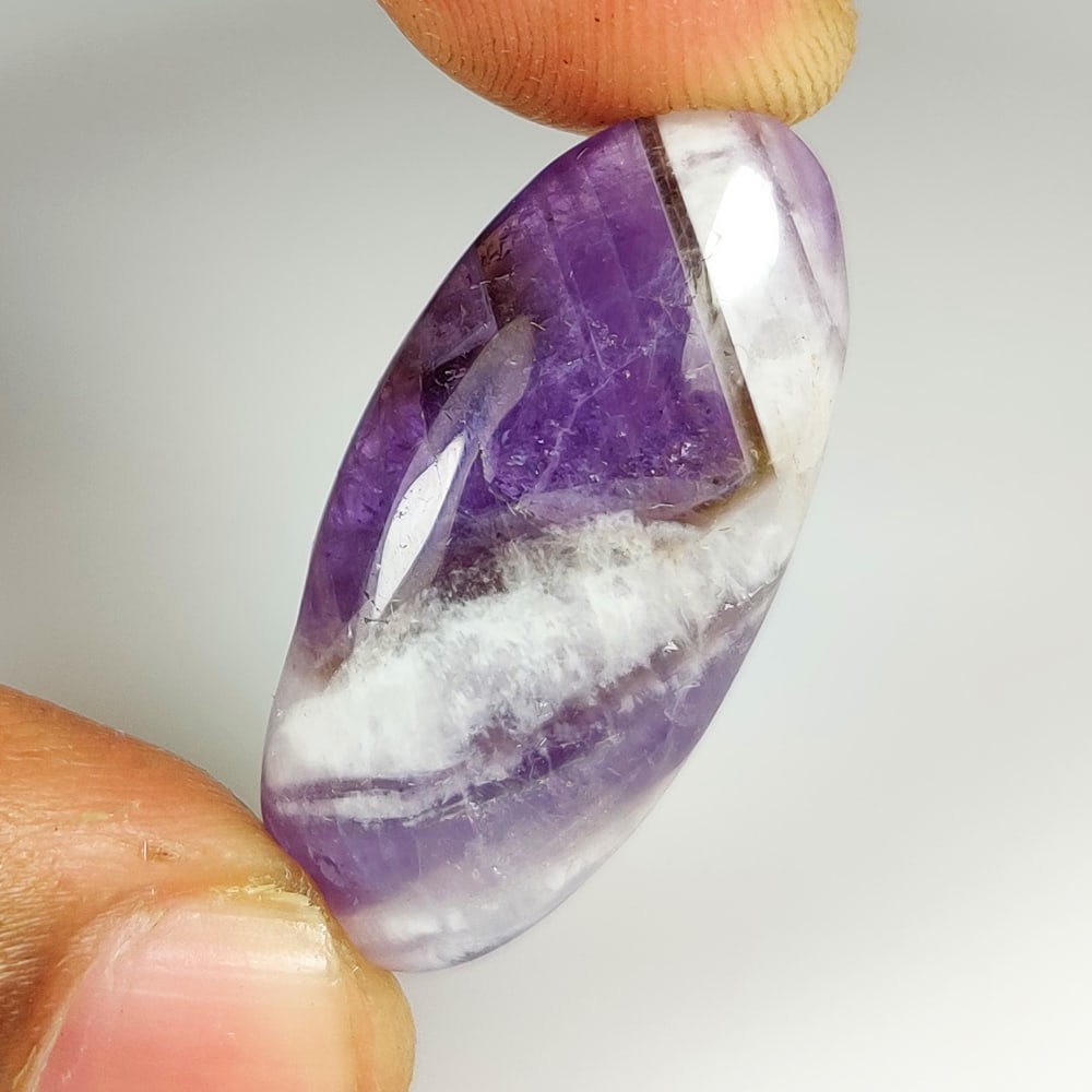 23.24 Ct Natural Chevron Amethyst Oval Cab (1 of 2)