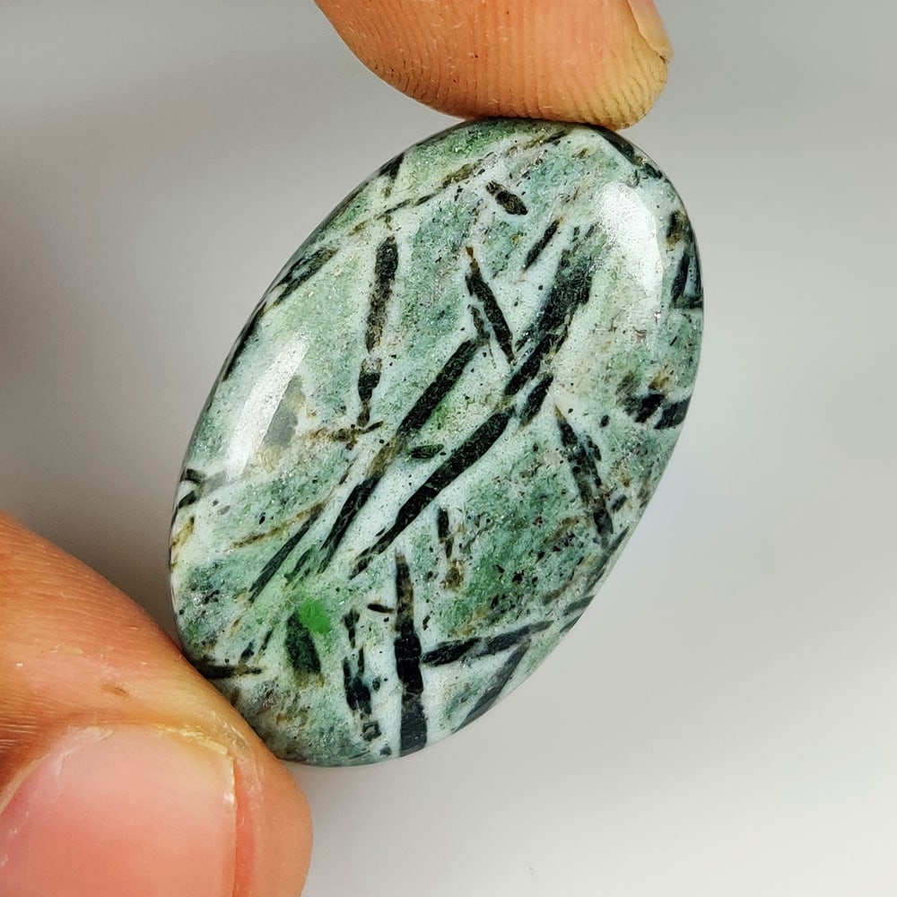 31.52 Ct Natural Hornblende Oval Cab (1 of 2)