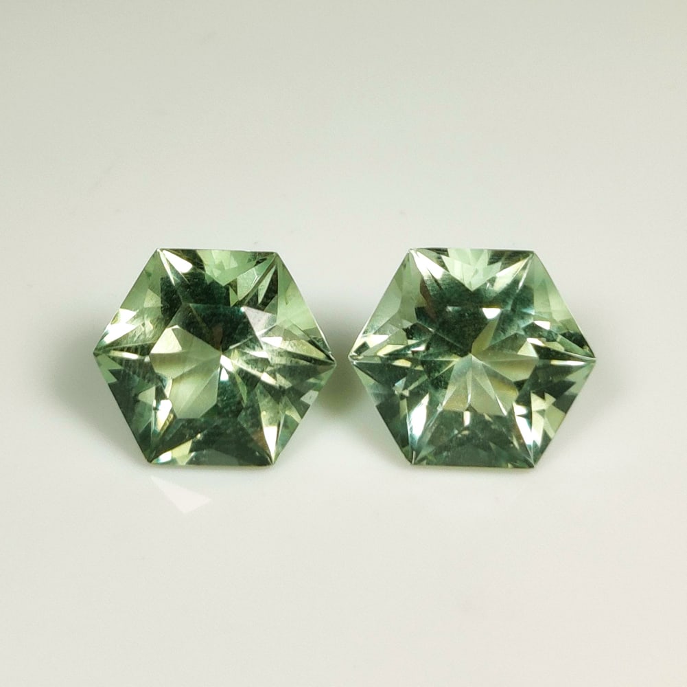 14.00 Ct Natural Green Amethyst Hexagon Cut Pair: Weight - 14.00 Ct / Size - 12.00 x 12.00 x 8.90 mm / 2 Pc's / Shape - Hexagon Cut / Color - Green / Clarity - VVS / Origin - Brazil / Treatment - Heated