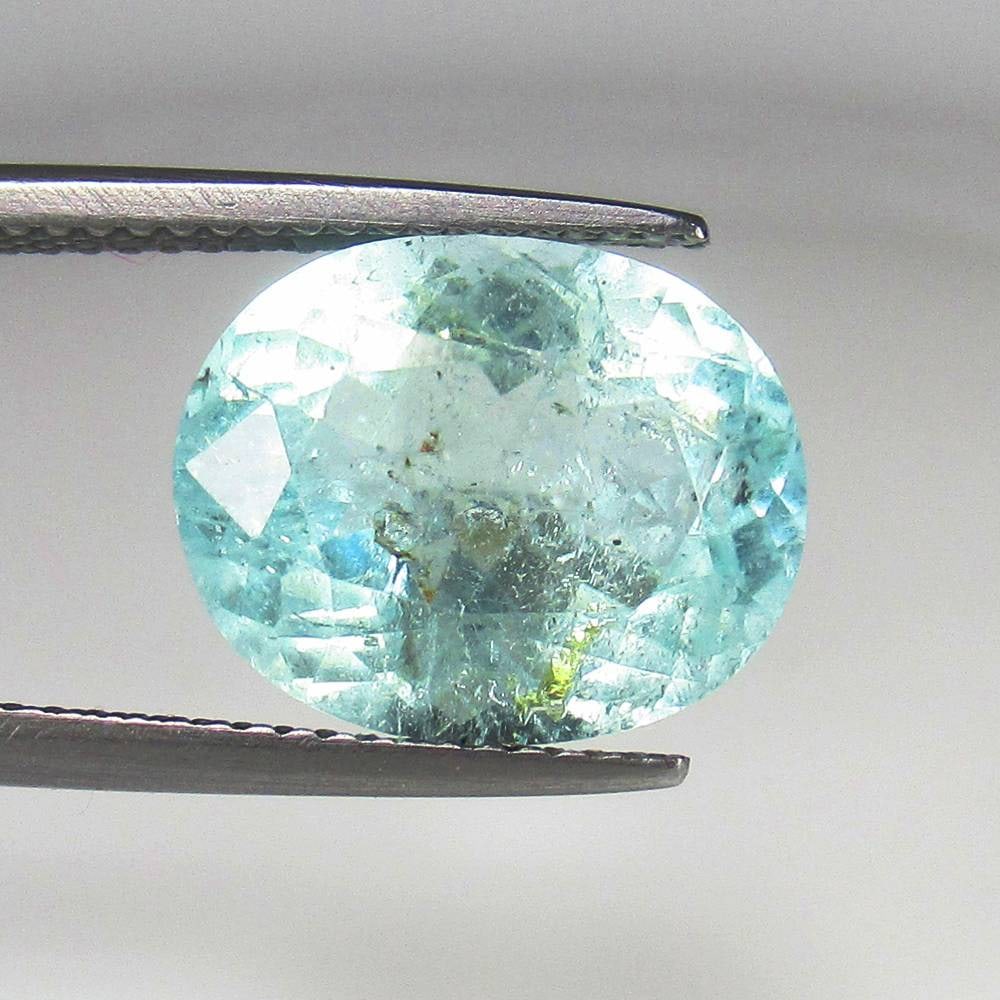 6.83 Ct Natural Bluish Green Amblygonite Oval Cut: Weight - 6.83 Ct / Dimensions - 13.20 x 10.70 x 7.20 mm / Shape - Oval Cut / Color - Blue / Clarity - SI / Origin - Brazil / Treatment - None