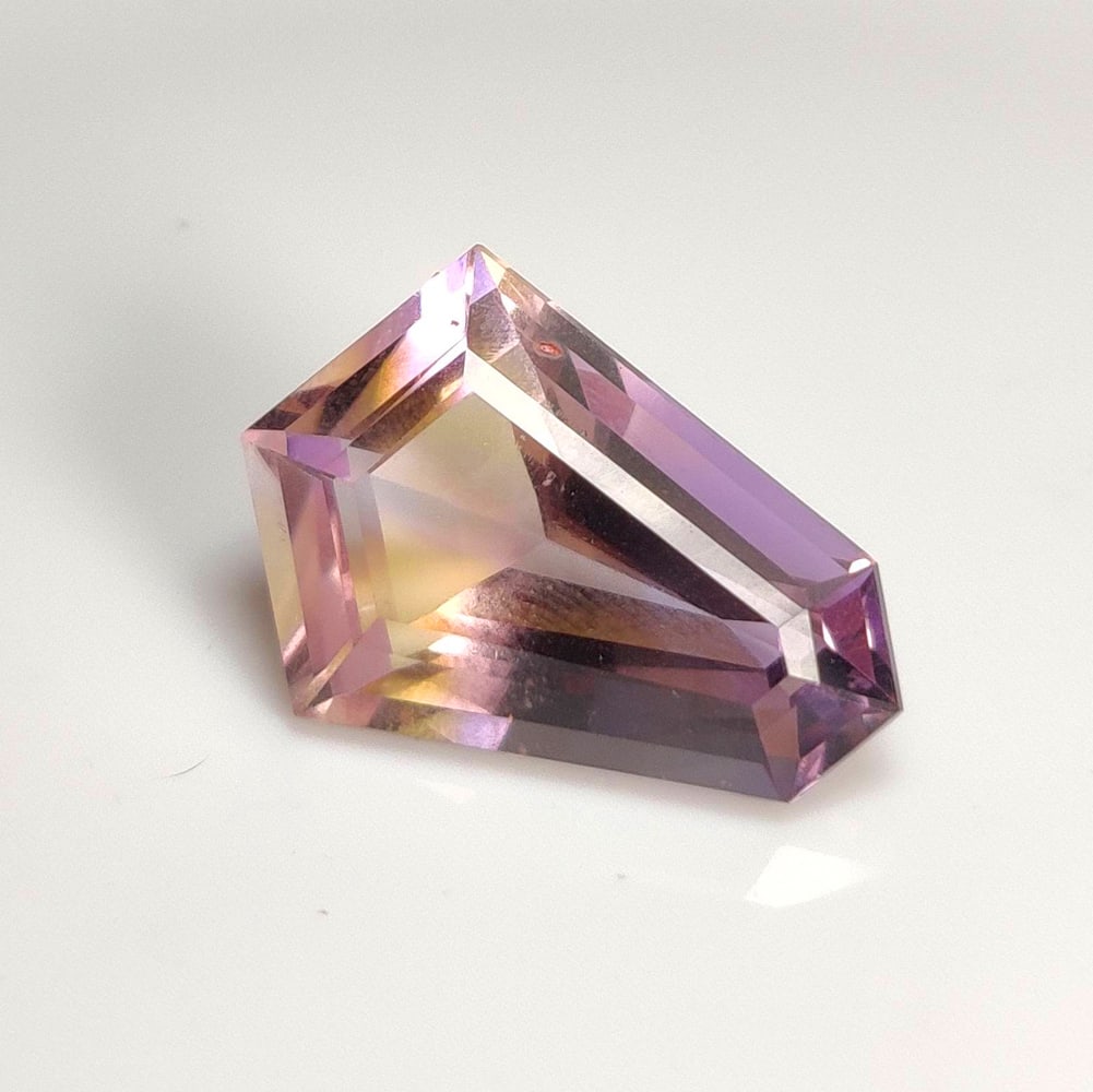 12.74 Ct Natural Bicolor Ametrine Fancy Cut: Weight - 12.74 Ct / Size - 20.80 x 14.60 x 9.40 mm / Shape - Fancy Cut / Color - Bicolor / Clarity - VVS / Origin -Brazil / Treatment - None