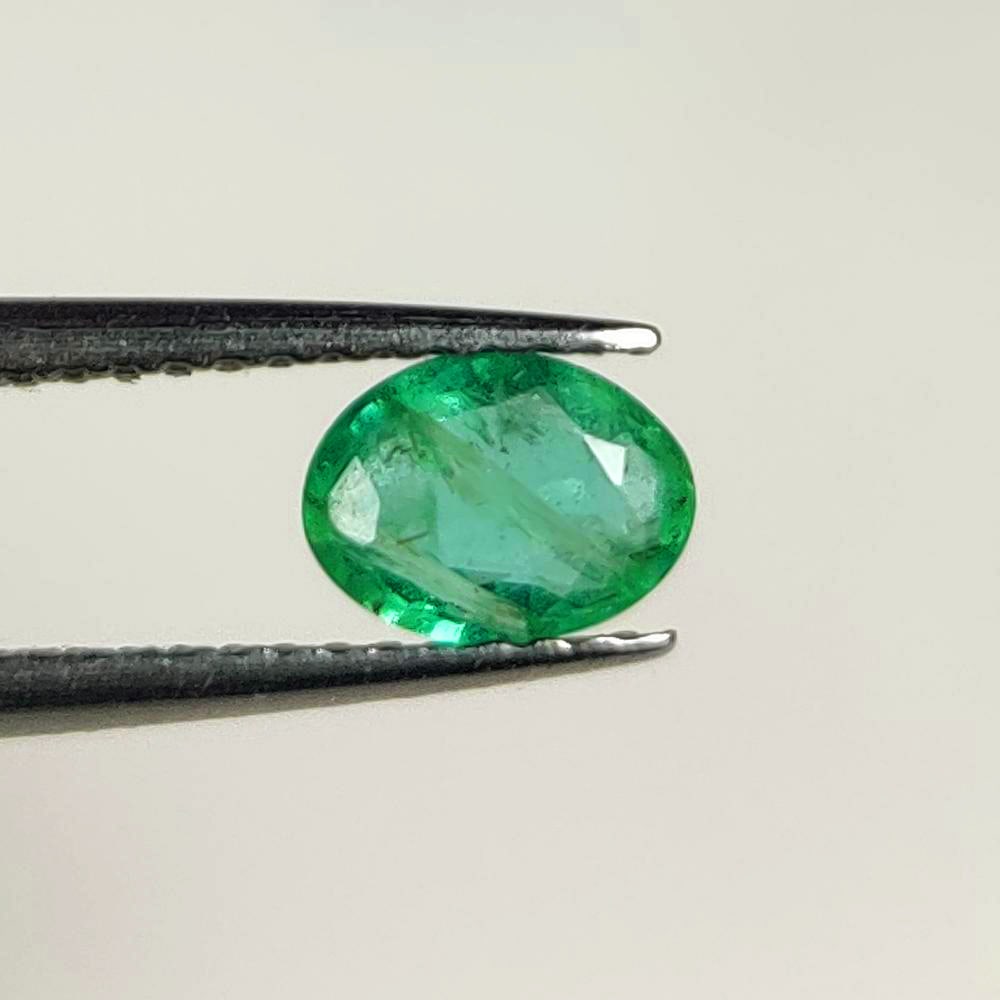 0.53 Ct Natural Zambian Green Emerald Oval Cut (1 of 2)