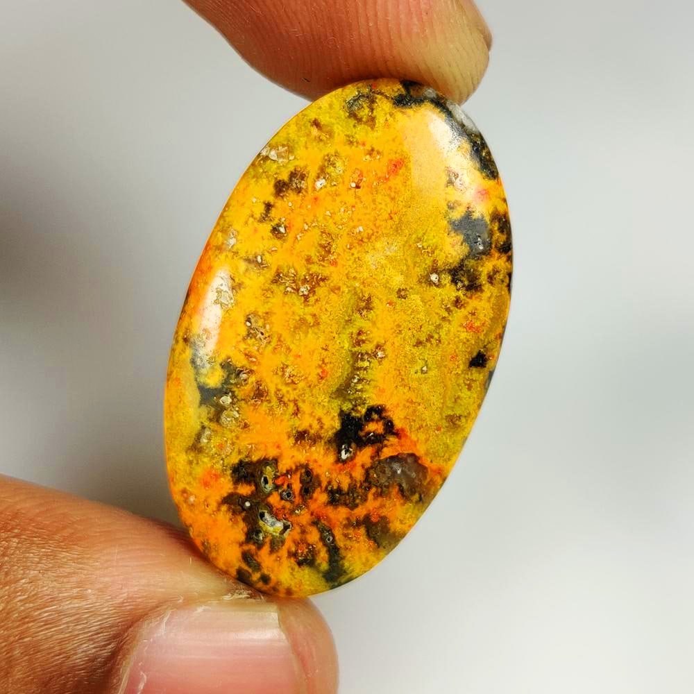 24.84 Ct Natural Bumblebee Jasper Oval Cab: Weight - 24.84 Ct / Dimensions - 34.00 x 19.20 x 5.00 mm / Shape - Oval Cab / Clarity - Opaque / Origin - Brazil / Treatment - None